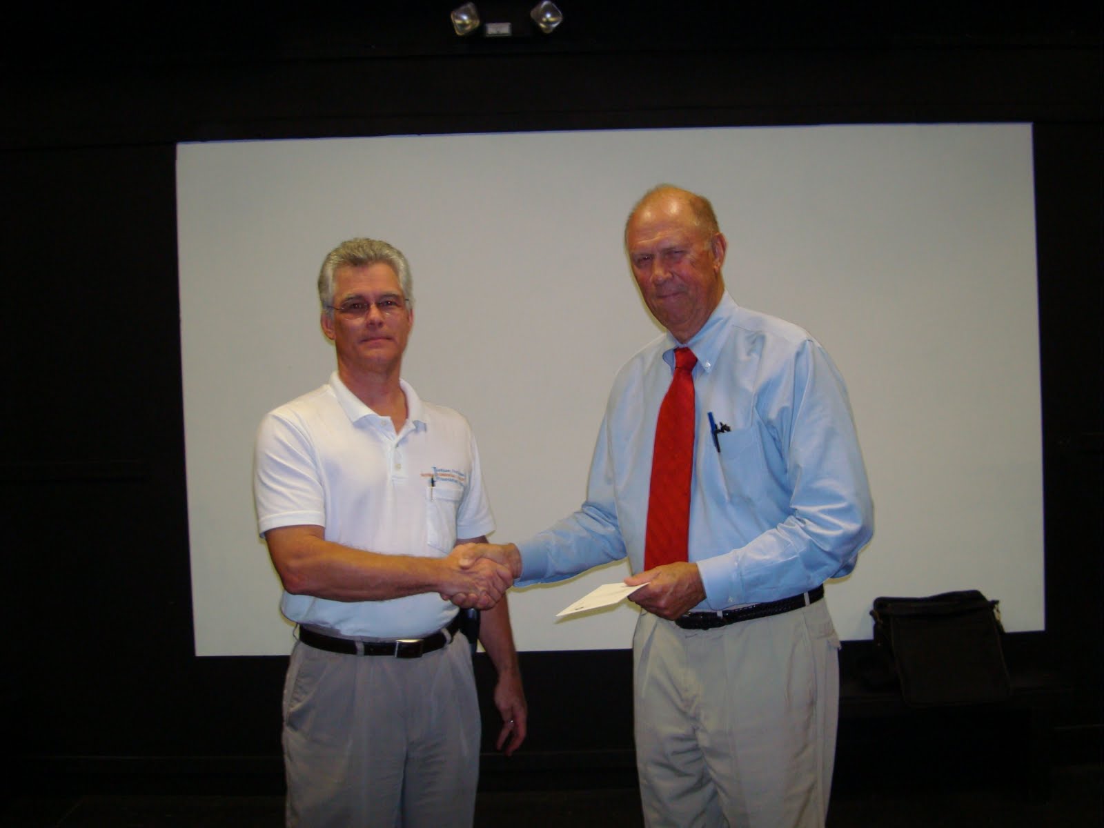 Colonel George Sullivan present the grant letter to RC&D Coordinator Robert Johnson